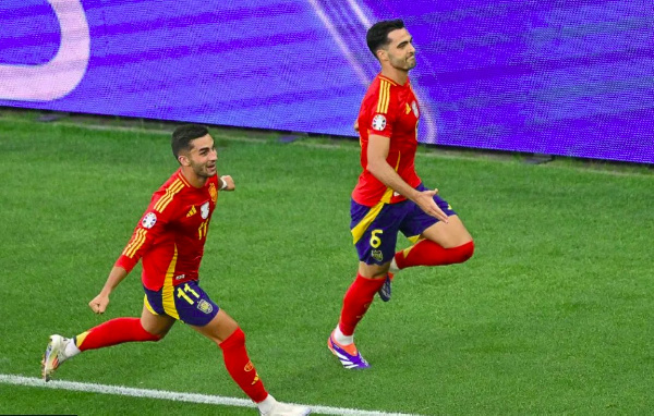 Ferran Torres and Mikel Merino celebrating Spain's winning goal