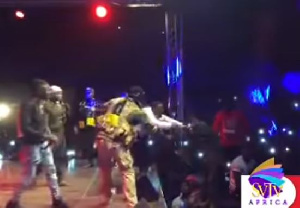 Stonebwoy swiftly grabbed the stick from the military officer who attacked his fan