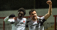 Jesurun (left) celebrates with a teammate