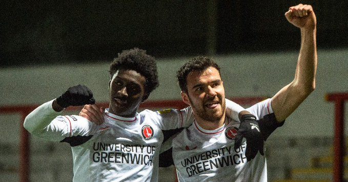 Jesurun (left) celebrates with a teammate