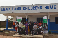 Officials of QNet making a presentation to one of the orphanages