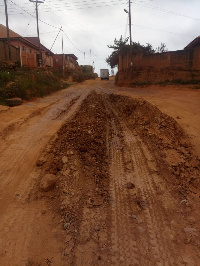 The untarred road spots various effects of erosion