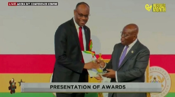 The award was presenter by President Nana Akufo-Addo [R]