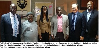 Group picture of Energy Minister Buah (3rd right) with Total delegation