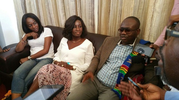 Nyantakyi and wife, Christine-Marie interacting with pressmen