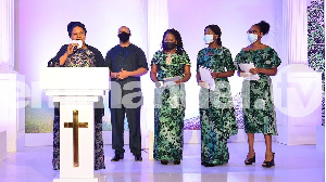 Mrs Joshua and im kiddies pay tribute to di popular televangelist