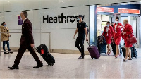 File photo of passengers olus airline staff for airport