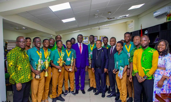 Dr. Yaw Osei Adutwum with the winners of the obofest World Championships, Prempeh College