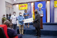 Zoomlion Ghana Limited has presented an amount of GHC100,000 to the COVI-19 National Trust Fund