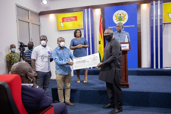 Zoomlion Ghana Limited has presented an amount of GHC100,000 to the COVI-19 National Trust Fund