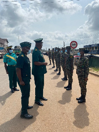 Western Regional Commander of the GIS, DCI/Dr. Prosper P.D. Asima pictured with some officers