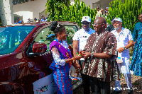 Bawumia hands over a car prize to a deserving teacher