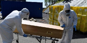 File photo: Health officials transporting a coffin