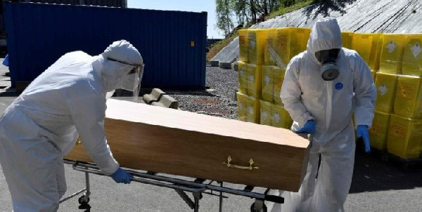 File photo: Health officials transporting a coffin