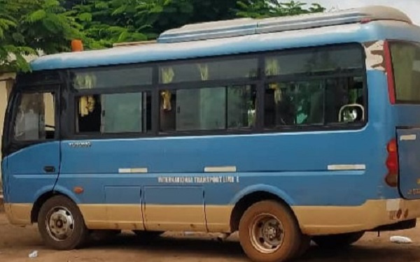 The bus that transported the 'strangers' to the registration centre