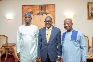 Speaker of Parliament, (M) flanked by Majority Leader (R) and Minority Leader