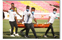 Jonathan Mensah being stretchered off after a head injury