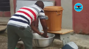 A delegate washing his hands