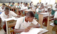 Pupils seated for an examination