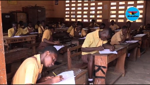 Students writing their BECE at the Kanda Cluster of Schools