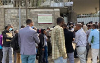 Ethiopian men have gathered at the Russian embassy following a recruitment rumor- Photo Credit - BBC