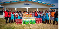 ABL officials in a group photograph with some of the orphans