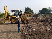 The refuse site in the Ada District undergoing clearing