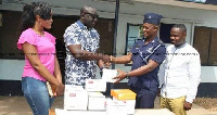 Nana Kwaku Ofori Attah presenting the cameras to the Police