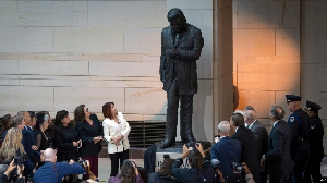 Congressional leaders and family members attended the ceremony, highlighting his legacy.