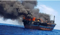 Occupants of the vessel are said to have set it on fire moments before their arrest