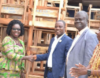 Isaac Agyapong, Kwahu East Chief Executive presented the desks to the District Education Directorate