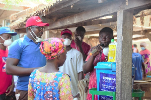 The Team Educating Market Women On How To Properly Wash Hands