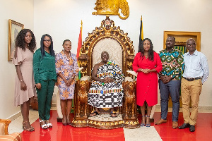 The Asantehene, Otumfuor Osei Tutu II with Vodafone officials