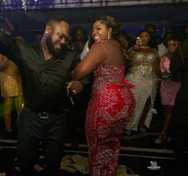 Frank Badu and wife, Tracey Boakye dancing at their wedding