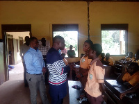 Alex Kofi Agyekum interacting with the BECE candidates