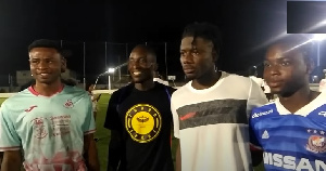 Ghana international Mohammed Salisu and young footballers in Madina