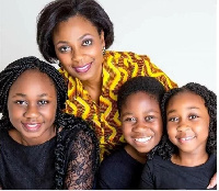 Kwansema Dumor, wife of late Ghanaian prolific broadcaster Komla Dumor and their three children