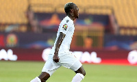 Guinea's Mohamed Yattara celebrates scoring their first goal