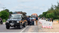 Security officers escort public service vehicles along the volatile Gamba-Witu road in Lamu County