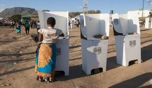 Women in a voting booth