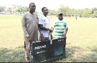 Osman Ibrahim with his 50-inch TV set