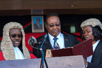 Malawi's President elect Arthur Peter Mutharika (centre) is sworn in for his second term,| AMOS GUM