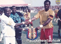 Hearts and Kotoko captains pose for the cameras during the 2004 Confed Cup final