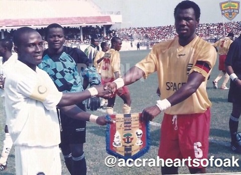 Hearts and Kotoko captains pose for the cameras during the 2004 Confed Cup final