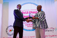 Nana Kwame Bediako receiving his award