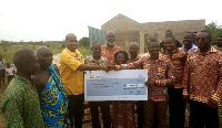 ICAG presented roofing materials worth GHC6,500 and a cheque of GHC5,000