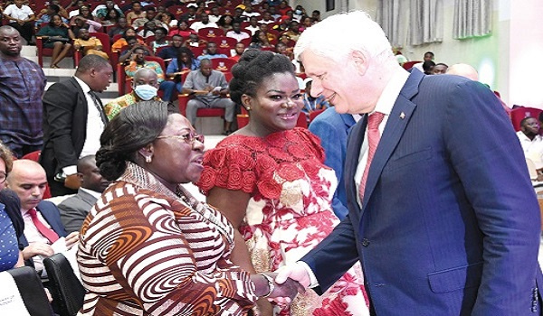 Former Prime Minister of Canada, Stephen Harper exchanging pleasantries with Akosua Frema Opare-Osei