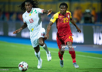 Thomas Agyepong of Ghana(R) and Sessi Octave D'almeida of Benin (L)