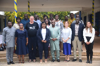 A group picture of participants and guest speakers at the event