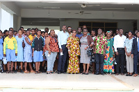 A group picture of participants and guest speakers at the event